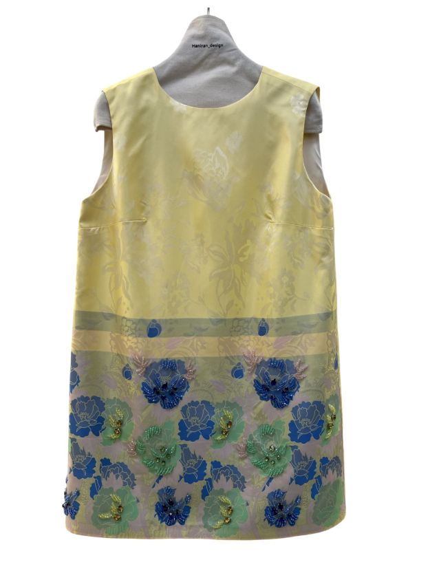 بیسادی پیراهن زرد و سبز گل